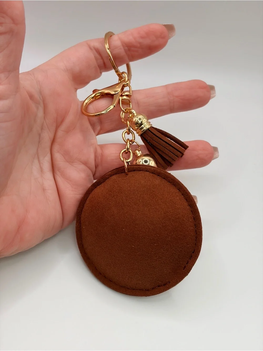 Crystal-Embellished Round Keychain Charm in Brown and Gold